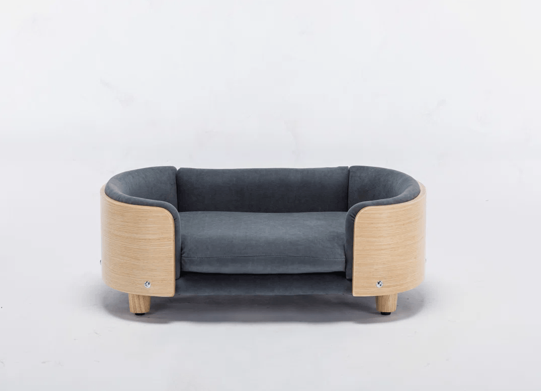 The Scandi Lounge luxury elevated dog bed in natural bentwood with gray velvet cushion